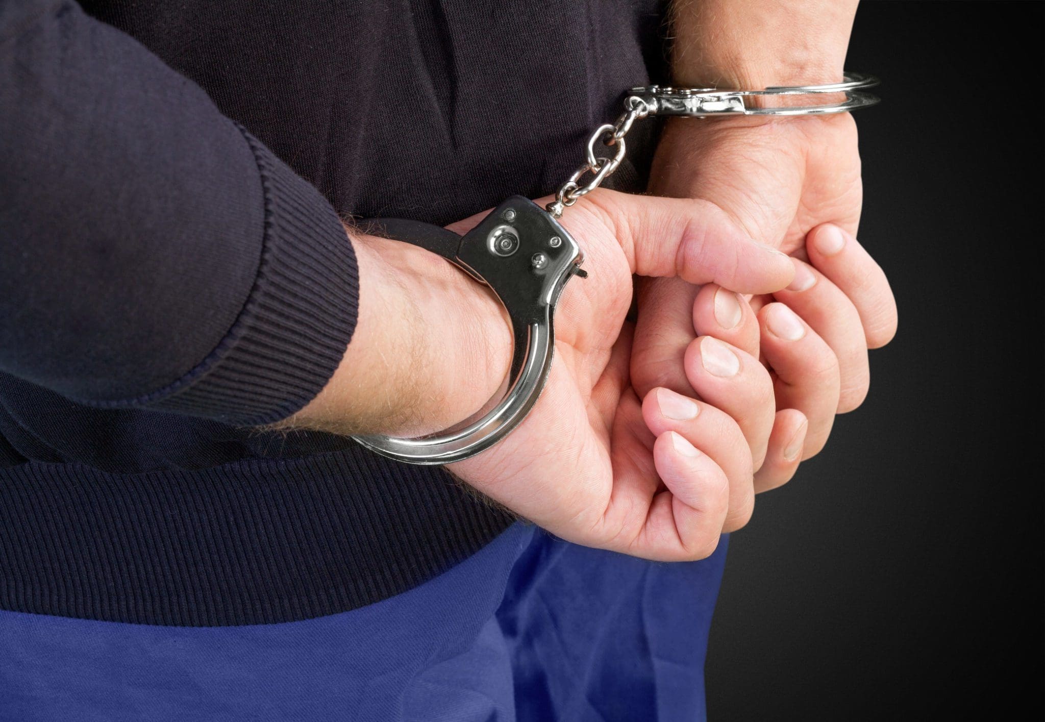 Arrested handcuffed criminal